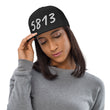 5813 In Pearl Embroidery on 5 Panel Trucker Cap