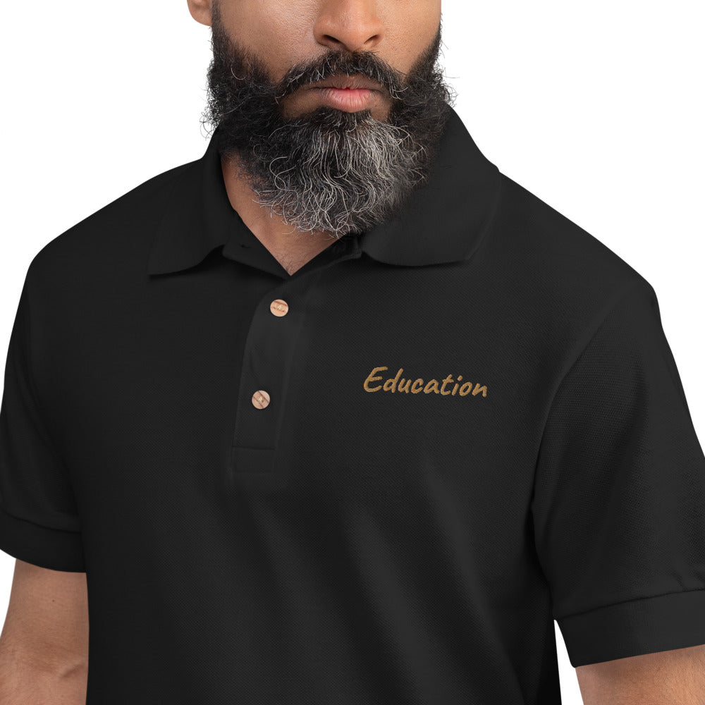 Education In Copper Embroidery on Men's Polo Shirt