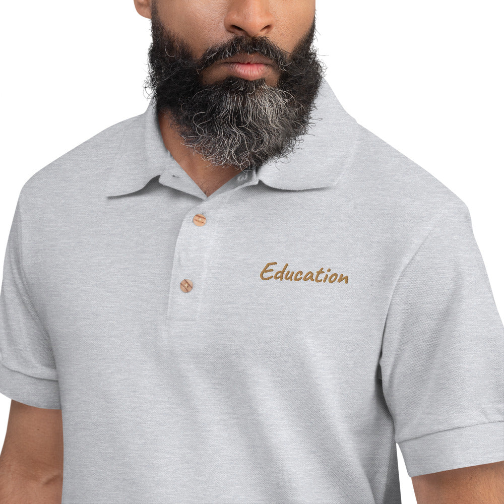 Education In Copper Embroidery on Men's Polo Shirt