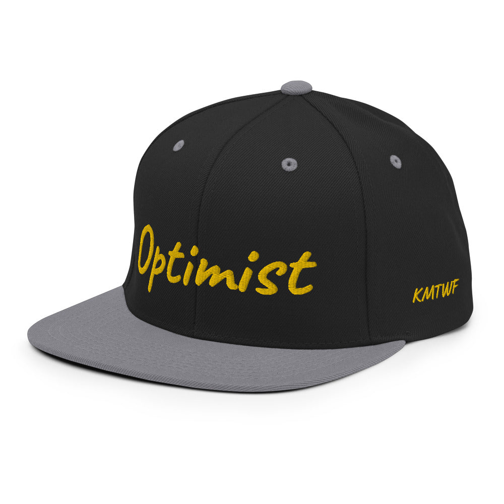 Optimist In Gold Embroidery on Classic Snapback Hat