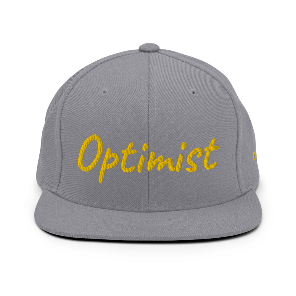 Optimist In Gold Embroidery on Classic Snapback Hat