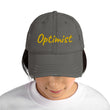 Optimist In Gold Embroidery on Distressed Dad Hat