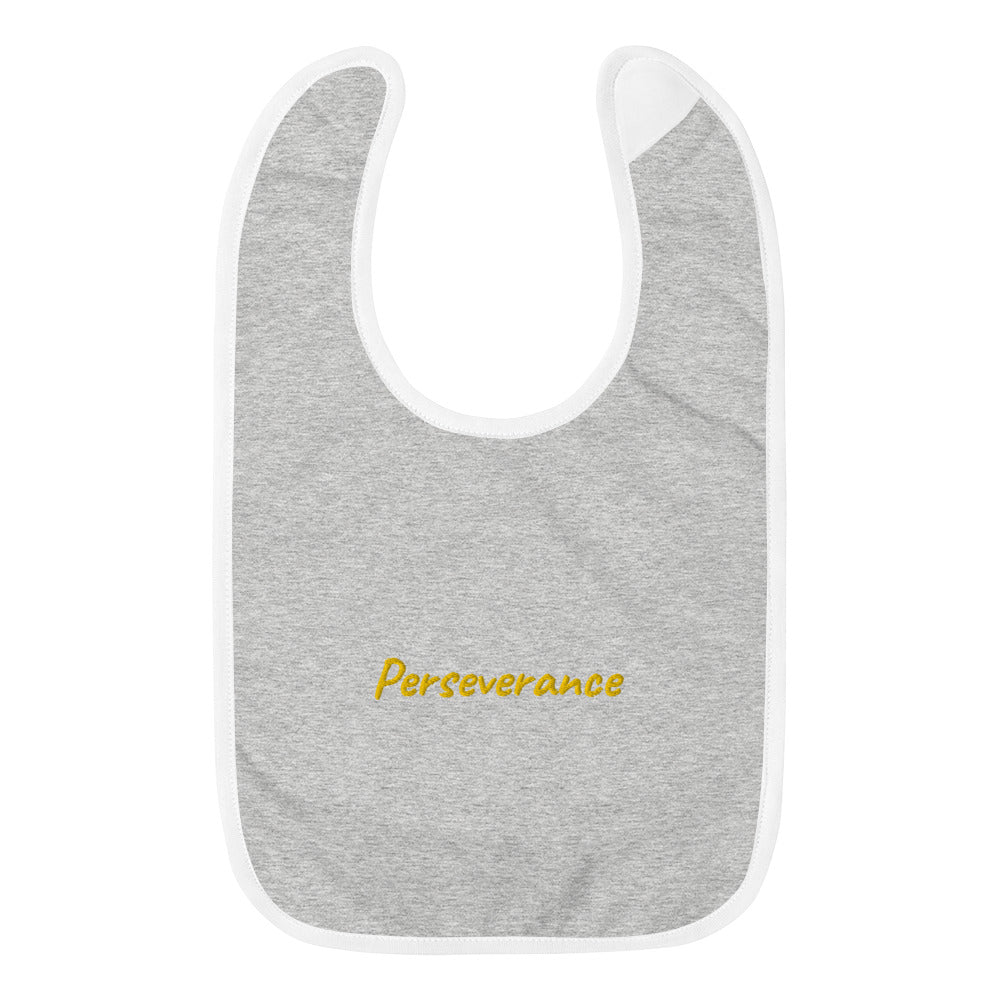 Perseverance In Gold Embroidery on Baby Bib