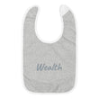 Wealth In Silver Embroidery on Baby Bib