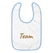 Team In Celluloid Embroidery on Baby Bib