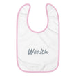 Wealth In Silver Embroidery on Baby Bib