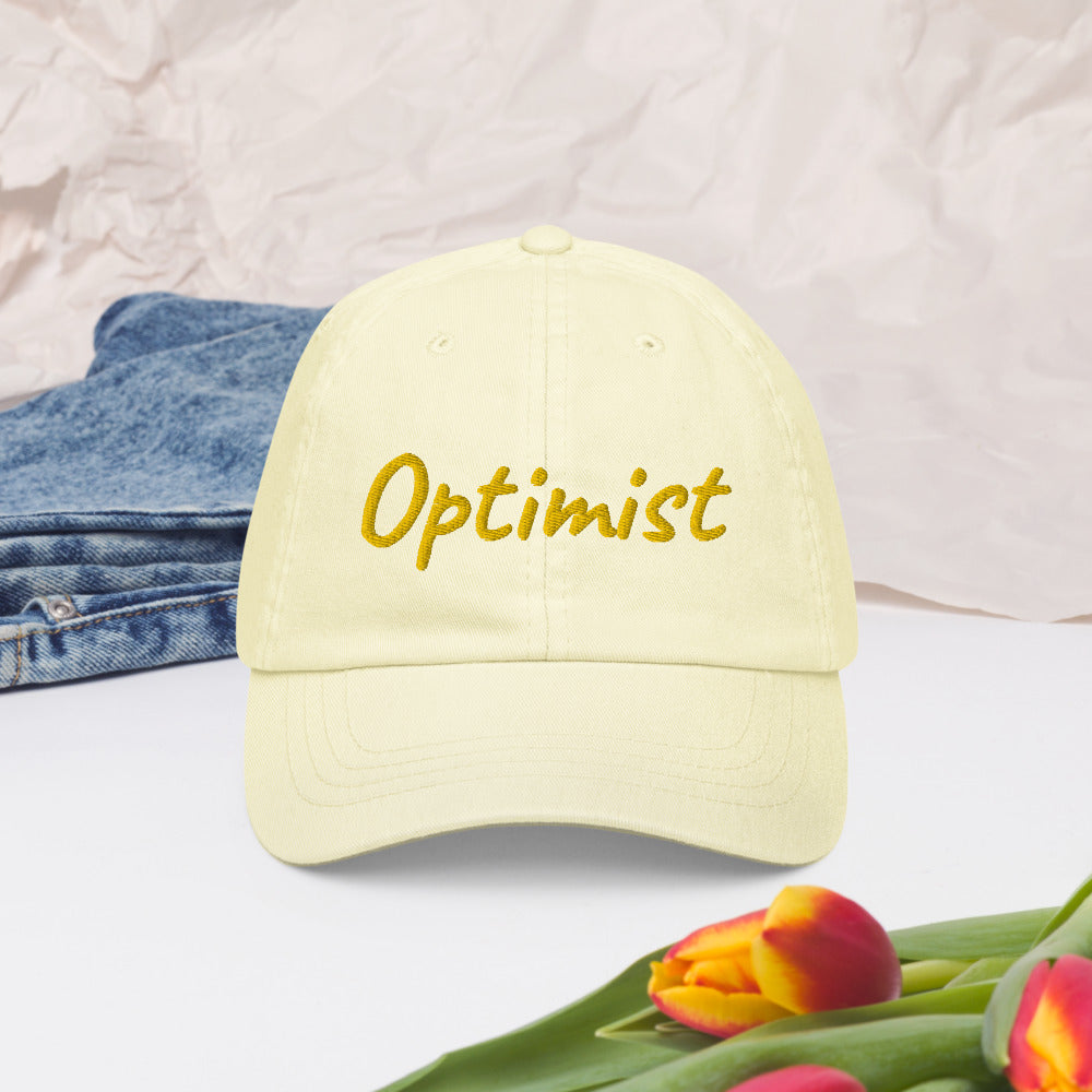 Optimist In Gold Embroidery on Pastel Baseball Cap