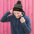 Courage In Amber Embroidery on Pom Pom Beanie