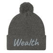 Wealth In Silver Embroidery on Pom Pom Beanie