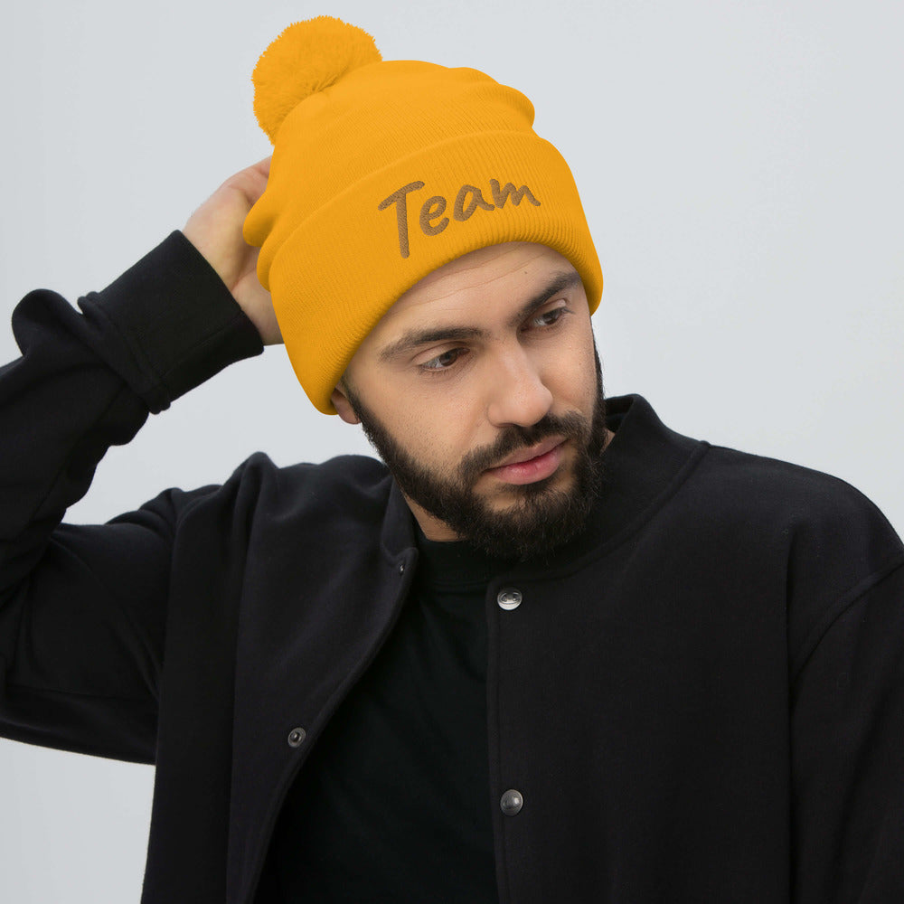 Team In Celluloid Embroidery on Pom Pom Beanie