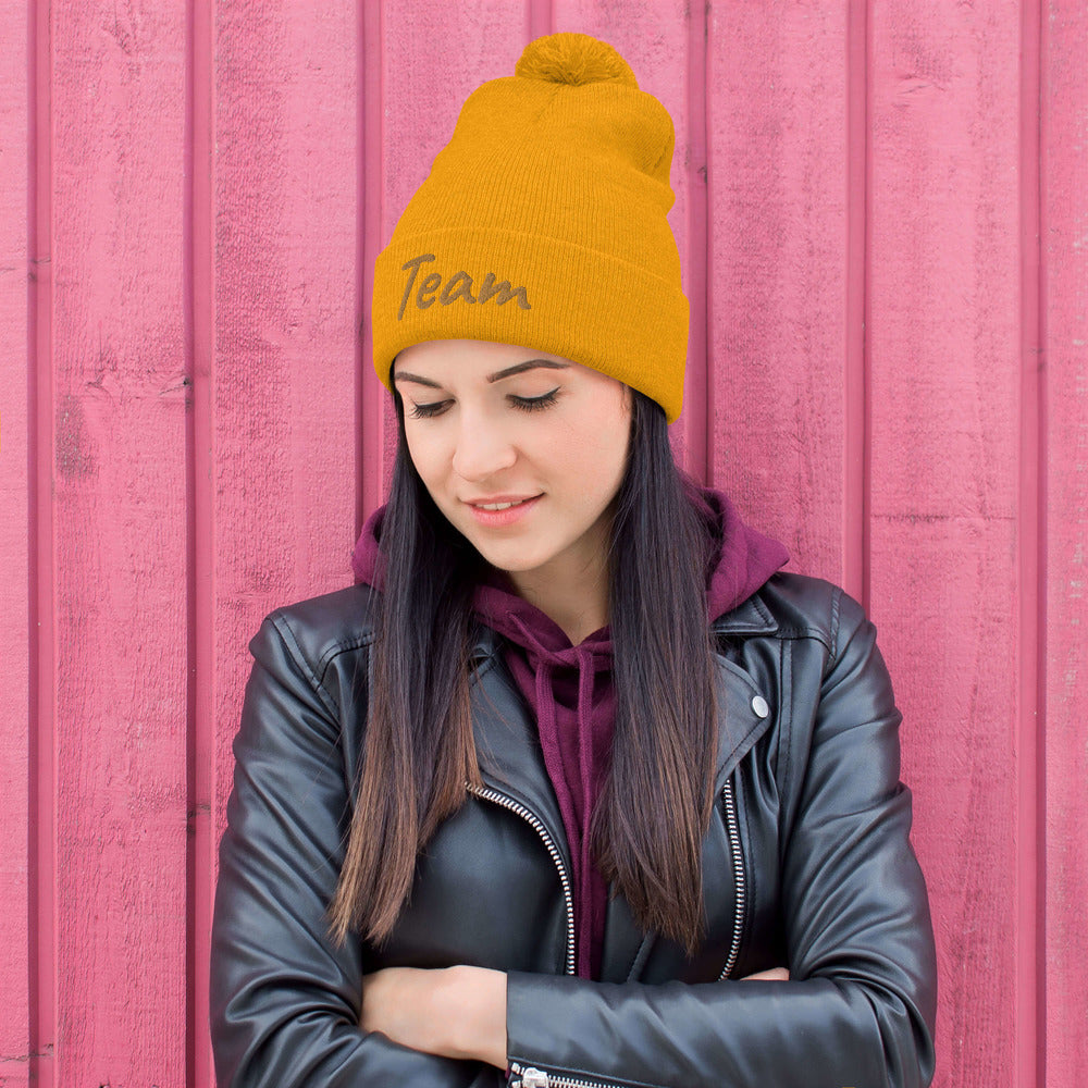 Team In Celluloid Embroidery on Pom Pom Beanie