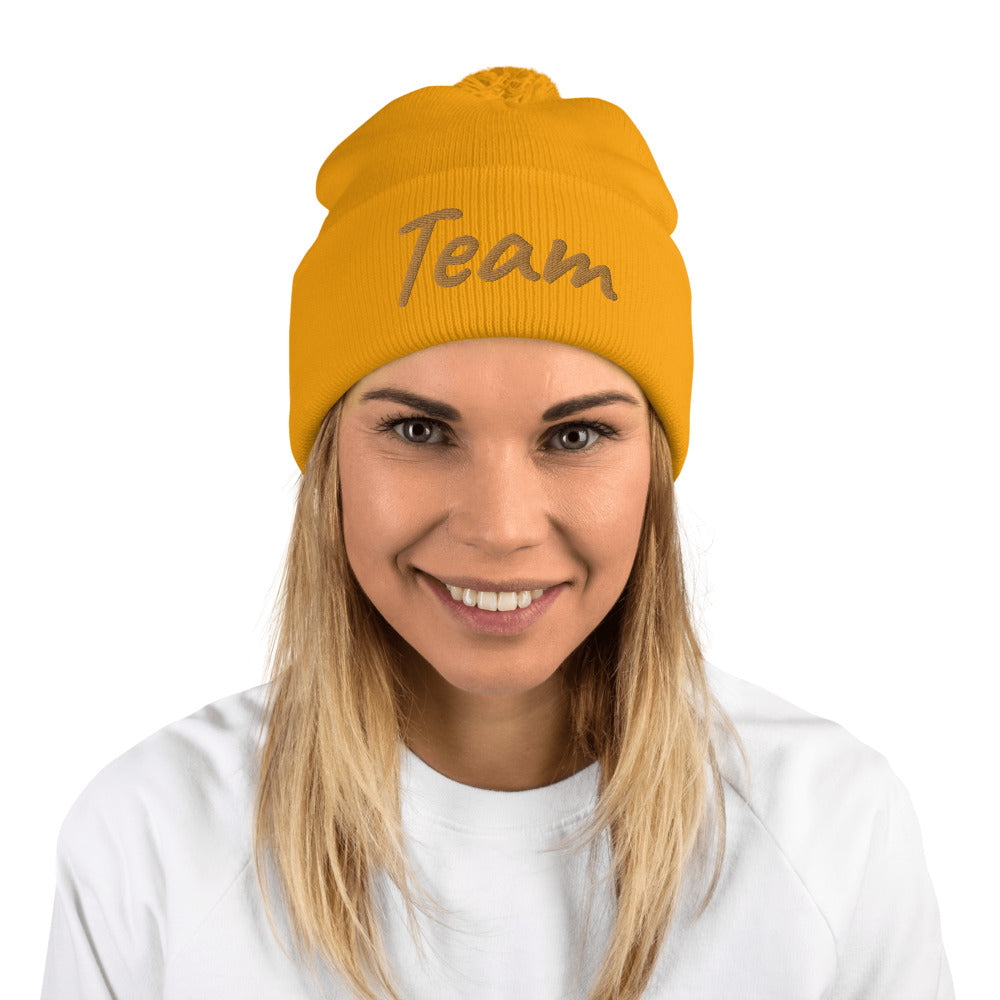 Team In Celluloid Embroidery on Pom Pom Beanie