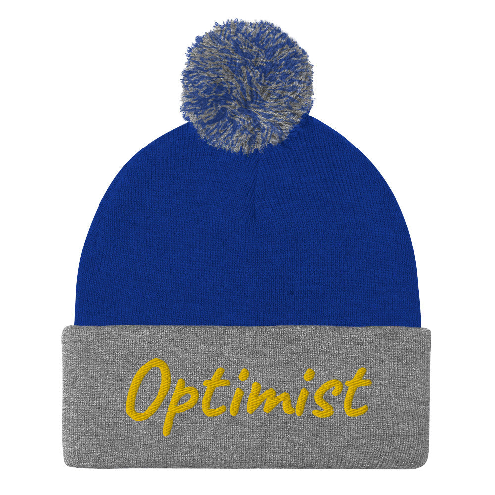 Optimist In Gold Embroidery on Pom Pom Beanie